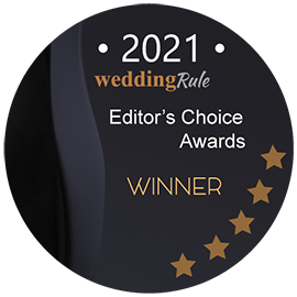 A circular badge with "2021 WeddingRule Editor's Choice Awards WINNER," adorned with five stars on the right side of the design ending the sentence.